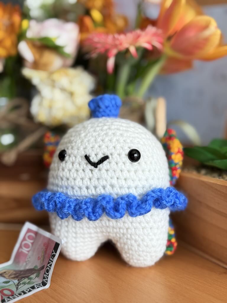 crochet toothfairy doll with wings, cash pocket, and gentle smile