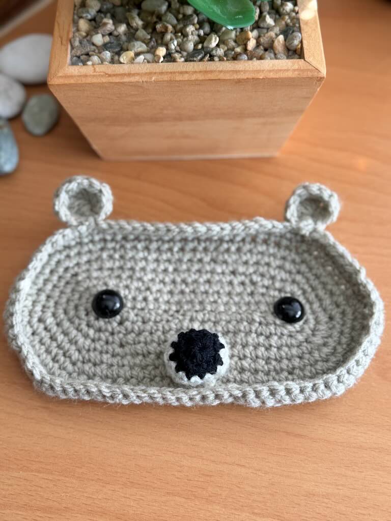 handmade crochet glasses holder with soft yarn and playful design