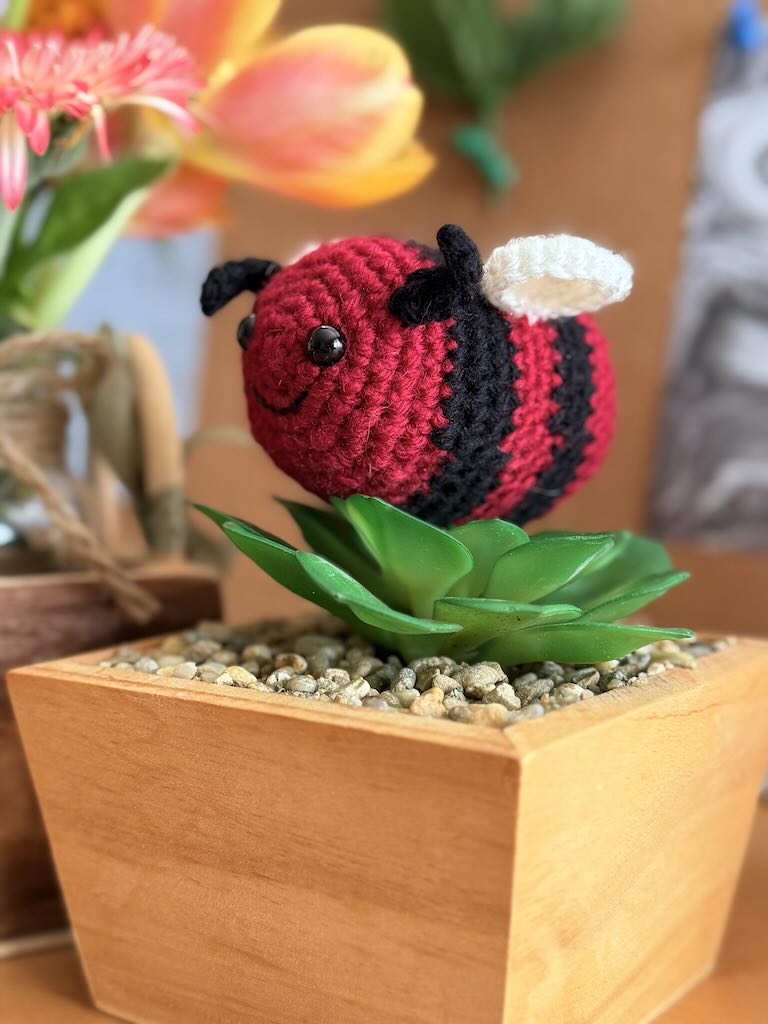 crochet little bee with red and black stripes