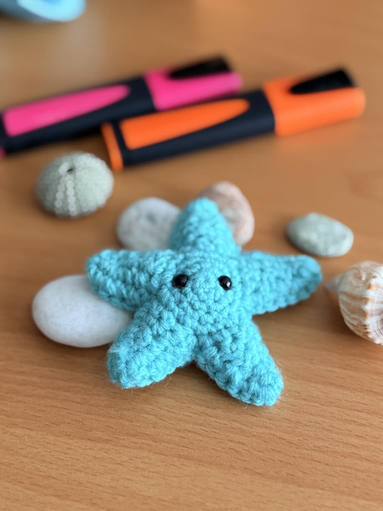crochet mini starfish toy with sea blue color and soft texture
