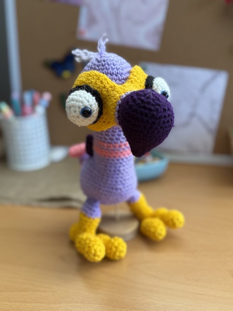 handmade crochet dodo bird toy named Donna with soft colorful yarn