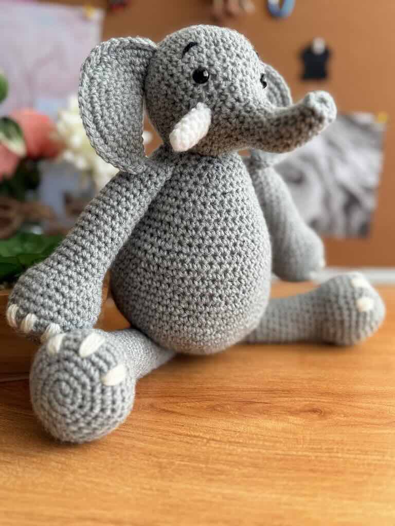 handmade crochet elephant toy named Elijah with large ears and soft body