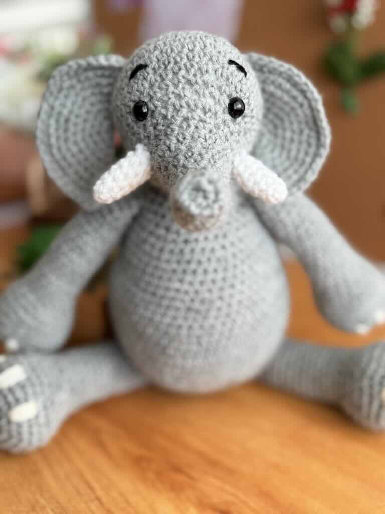 handmade crochet elephant toy named Elijah with large ears and soft body