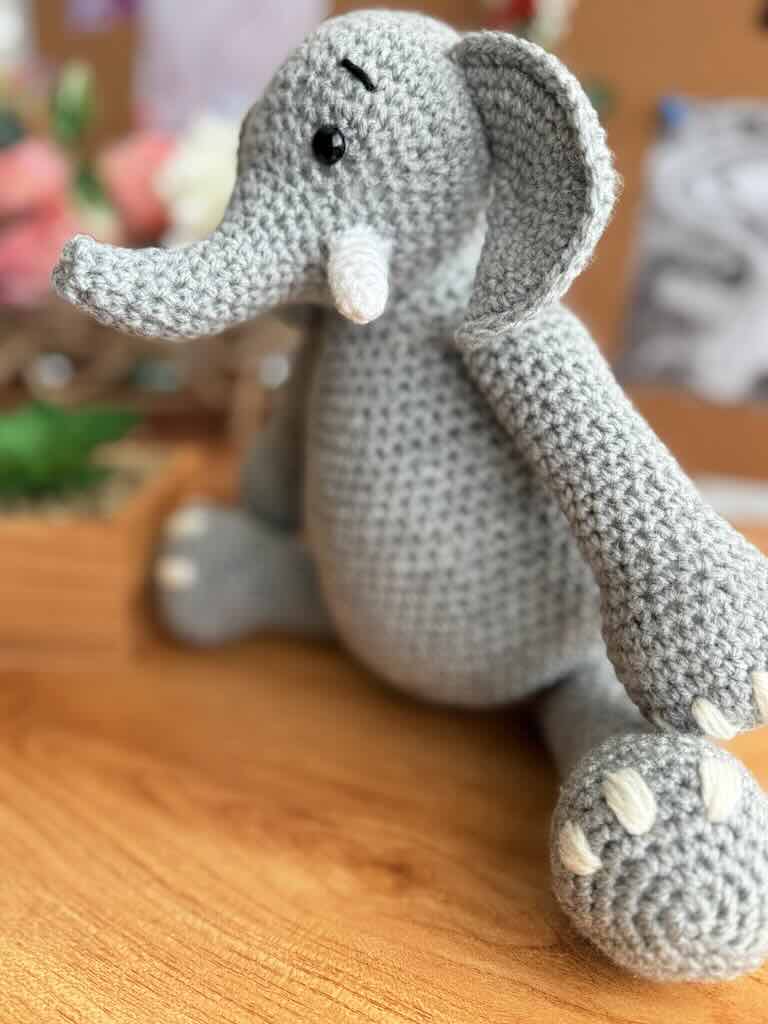 handmade crochet elephant toy named Elijah with large ears and soft body