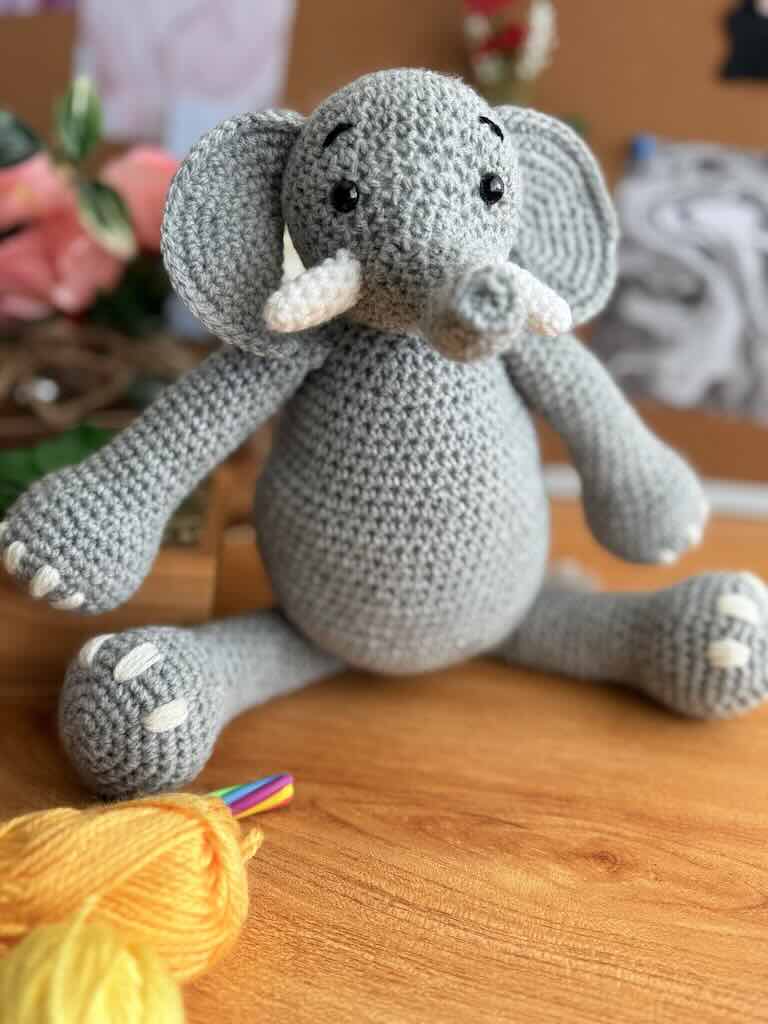 handmade crochet elephant toy named Elijah with large ears and soft body